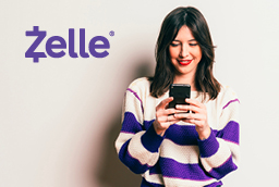 woman using Zelle to transfer money